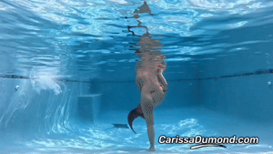 www.carissadumond.com - Carissa as a topless teasing mermaid in the pool thumbnail